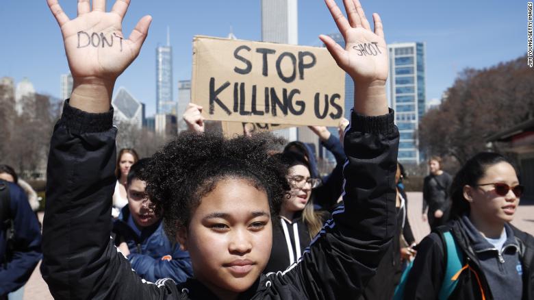 CHICAGO%2C+IL+-+APRIL+20%3A+A+student+holds+up+her+hands+while+taking+part+in+National+School+Walkout+Day+to+protest+school+violence+on+April+20%2C+2018+in+Chicago%2C+Illinois.+Students+from+around+the+nation+joined+in+the+walkout+against+gun+violence+on+the+19th+anniversary+of+the+shooting+at+Columbine+High+School+where+13+people+were+killed.+%28Photo+by+Jim+Young%2FGetty+Images%29