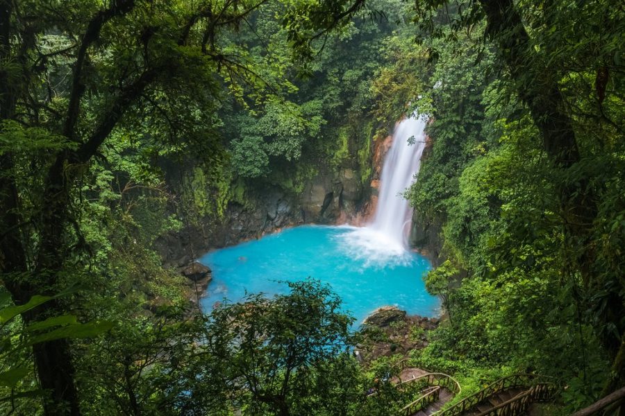Waterfall and natural pool with turquoise water of Rio Celeste, Costa Rica