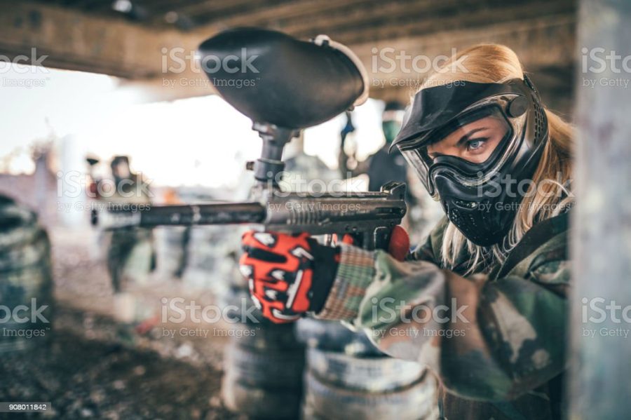 Paintball player on field